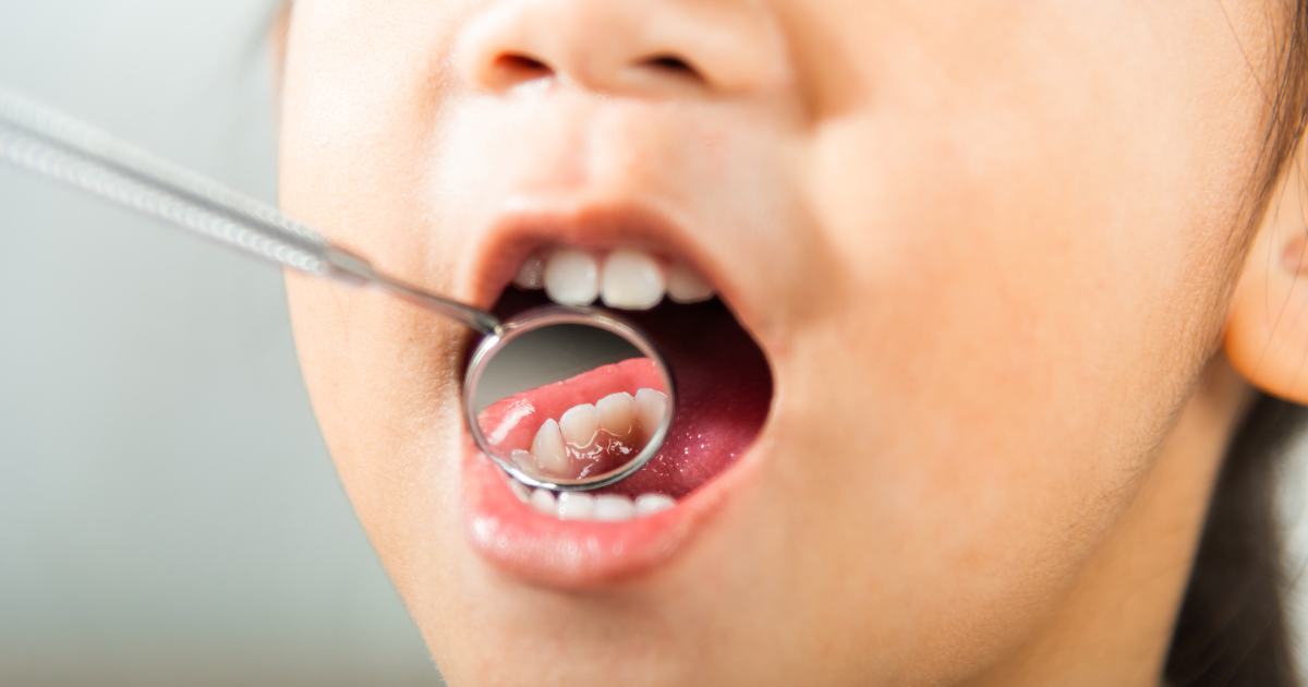 Child using VR at dentist: Protecting oral health in the digital age.