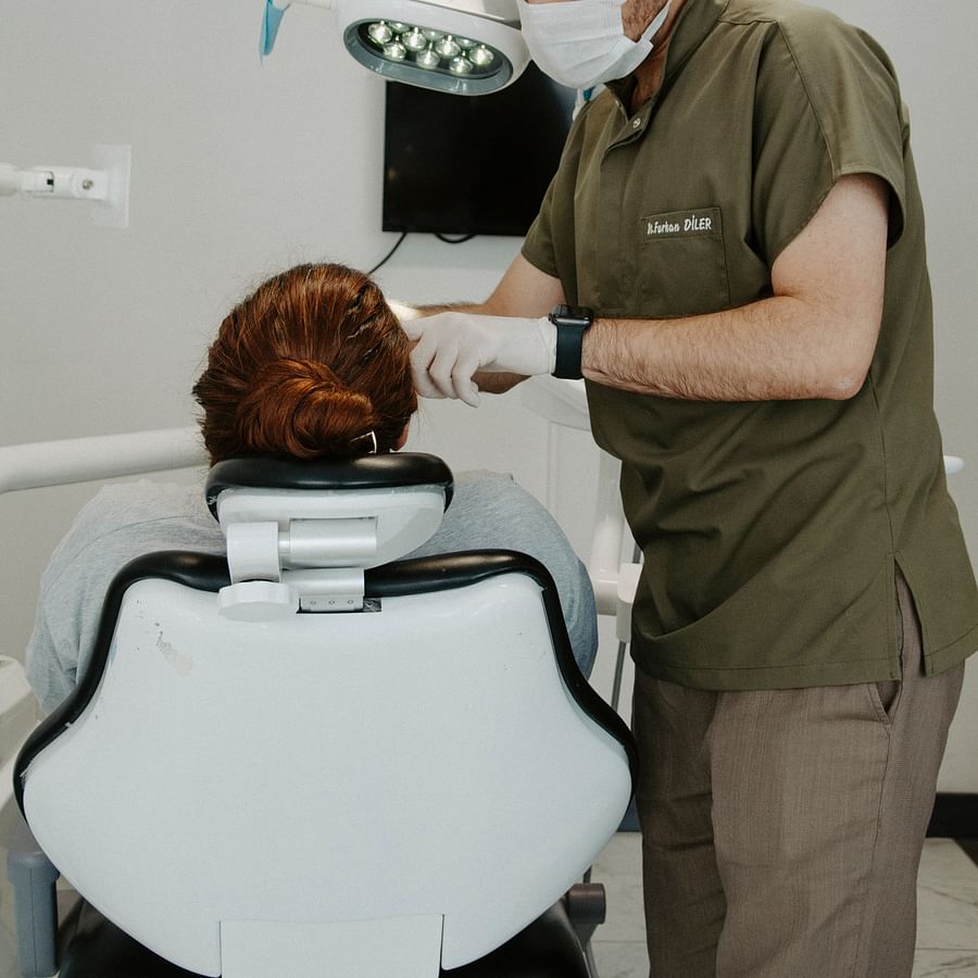 Dentist providing dental care to a special needs patient