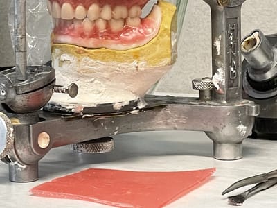 Day One Dentures & Implants (formerly Hauffe Dental)