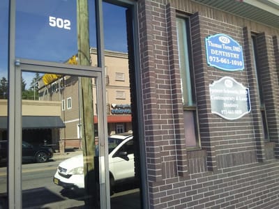 Dr. Thomas Torre DMD {Family, Cosmetic and Implant Dentistry }