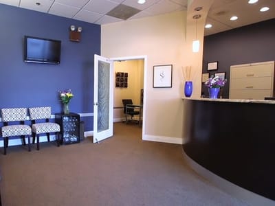 Modern Essence Dentistry & Dental Implants: Dr. Brainard Llanes, DDS, FICOI